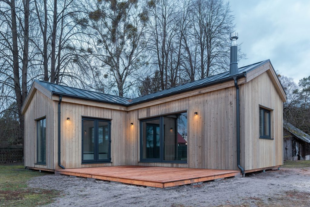 Дача Скандинавия Г-образный дом в современном скандинавском стиле