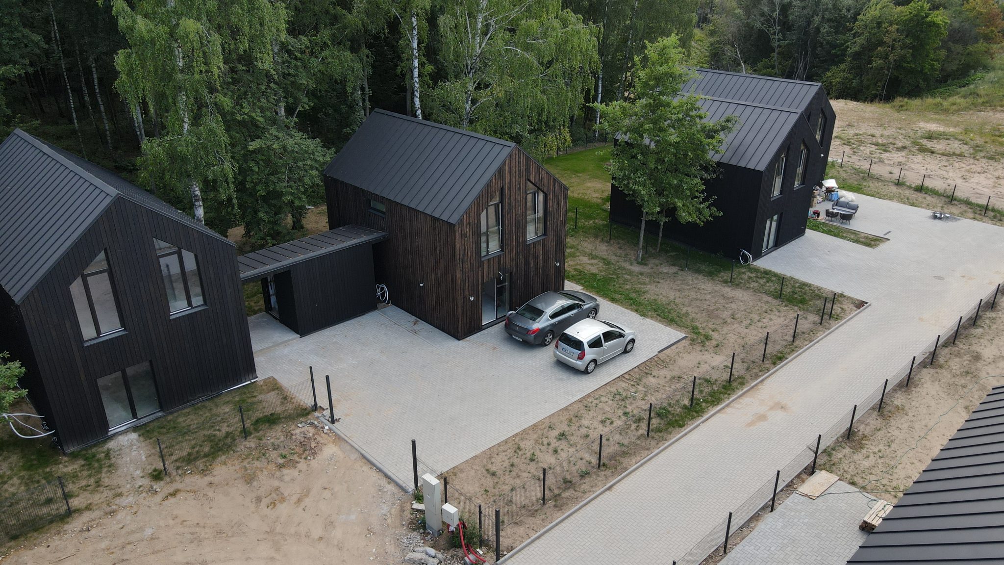 HouseModul įgyvendinti skydiniai namai Kauno rajone